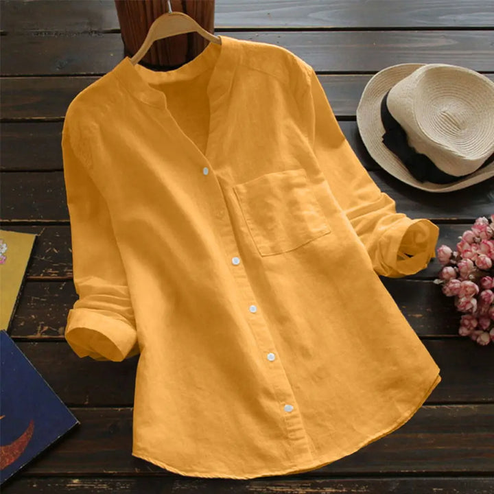 "Autumn™ | Bluzka z dekoltem w serek" can be rewritten as "Autumn™ | Bluzka z V-dekoltem".